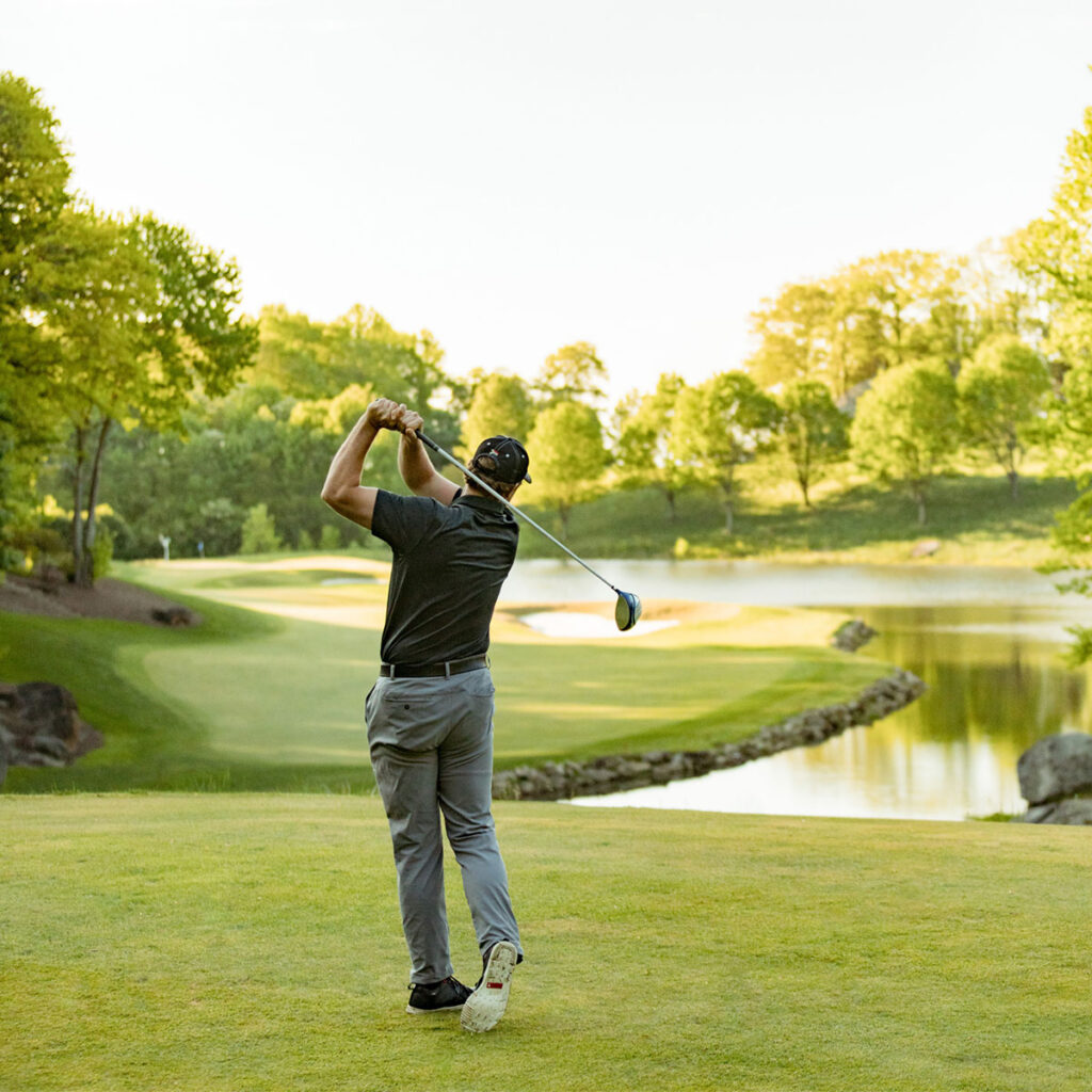Player tees off at The Cliffs Glassy golf course