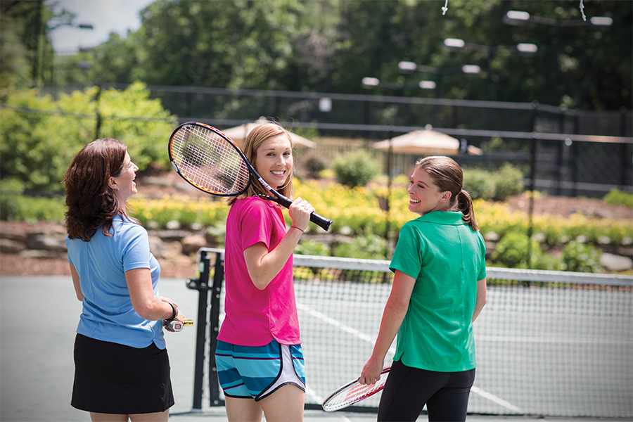 Ladies enjoying tennis at The Cliffs