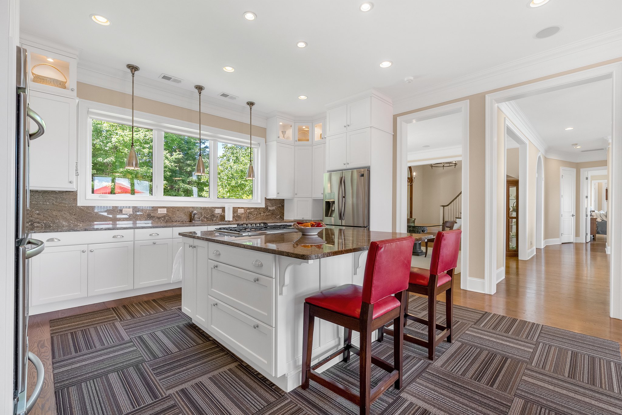 luxurious entryway and kitchen